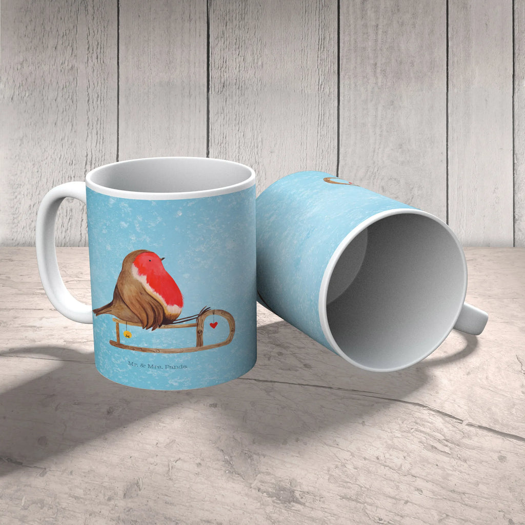 Tasse Rotkehlchen Schlitten Tasse, Kaffeetasse, Teetasse, Becher, Kaffeebecher, Teebecher, Keramiktasse, Porzellantasse, Büro Tasse, Geschenk Tasse, Tasse Sprüche, Tasse Motive, Kaffeetassen, Tasse bedrucken, Designer Tasse, Cappuccino Tassen, Schöne Teetassen, Winter, Weihnachten, Weihnachtsdeko, Nikolaus, Advent, Heiligabend, Wintermotiv, Schlitten, Vogel