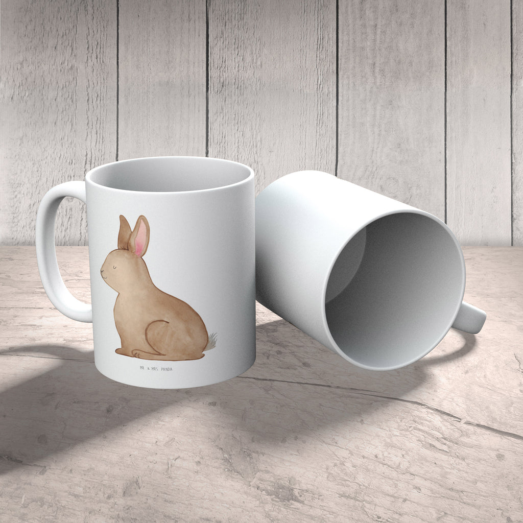 Tasse Hase Sitzen Tasse, Kaffeetasse, Teetasse, Becher, Kaffeebecher, Teebecher, Keramiktasse, Porzellantasse, Büro Tasse, Geschenk Tasse, Tasse Sprüche, Tasse Motive, Kaffeetassen, Tasse bedrucken, Designer Tasse, Cappuccino Tassen, Schöne Teetassen, Ostern, Osterhase, Ostergeschenke, Osternest, Osterdeko, Geschenke zu Ostern, Ostern Geschenk, Ostergeschenke Kinder, Ostern Kinder, Frohe Ostern, Ostergrüße, Osterblume, Liebe, Grüße, Hase, Kaninchen