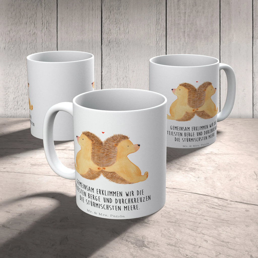 Tasse Igel händchenhaltend Tasse, Kaffeetasse, Teetasse, Becher, Kaffeebecher, Teebecher, Keramiktasse, Porzellantasse, Büro Tasse, Geschenk Tasse, Tasse Sprüche, Tasse Motive, Kaffeetassen, Tasse bedrucken, Designer Tasse, Cappuccino Tassen, Schöne Teetassen, Liebe, Partner, Freund, Freundin, Ehemann, Ehefrau, Heiraten, Verlobung, Heiratsantrag, Liebesgeschenk, Jahrestag, Hocheitstag, Igel, Igelliebe, Hand in Hand, Liebesbeweis, große Liebe, Liebesbotschaft, Hochzeit, Lieblingsmensch, Gemeinsamkeit, Love, Geschenk für zwei