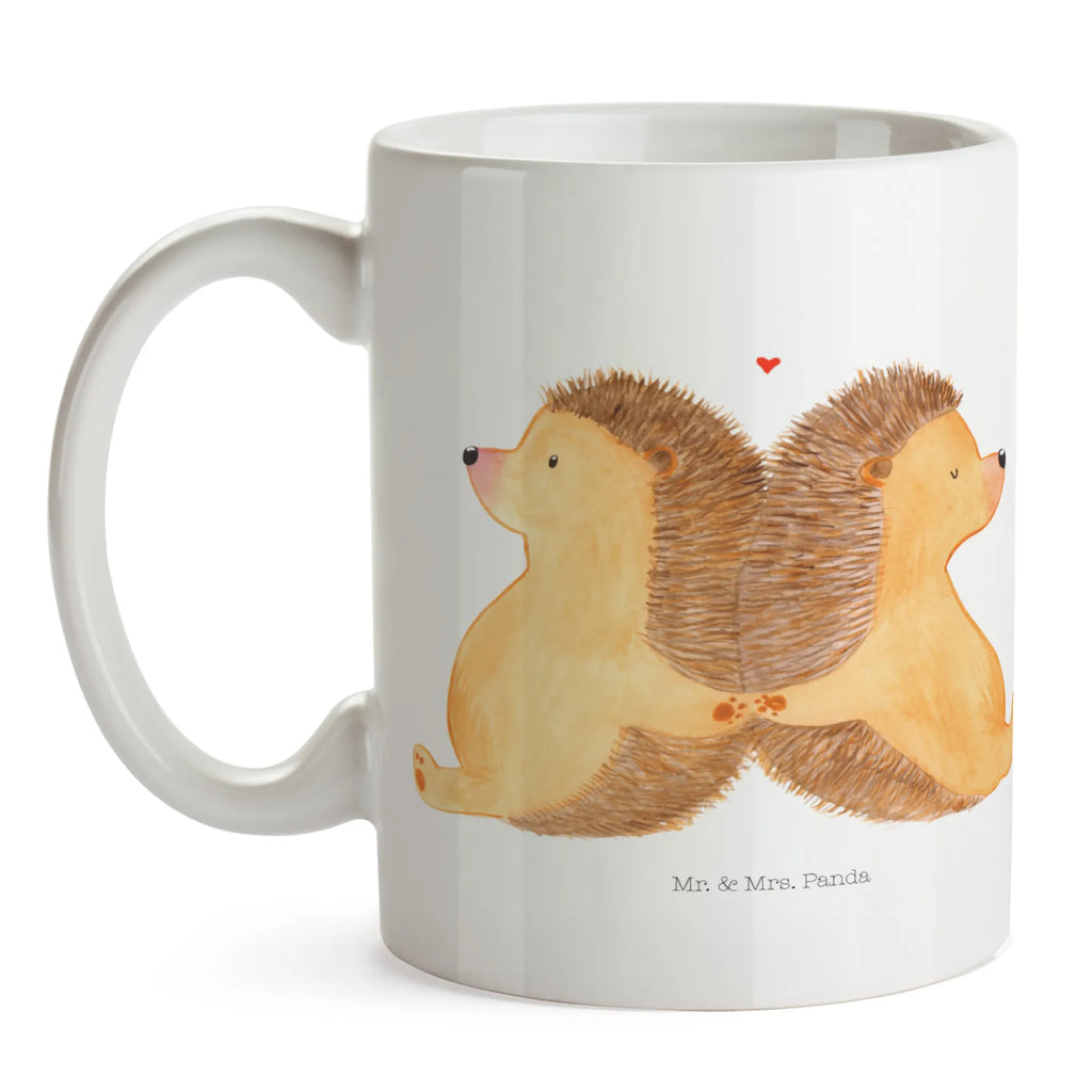 Tasse Igel händchenhaltend Tasse, Kaffeetasse, Teetasse, Becher, Kaffeebecher, Teebecher, Keramiktasse, Porzellantasse, Büro Tasse, Geschenk Tasse, Tasse Sprüche, Tasse Motive, Kaffeetassen, Tasse bedrucken, Designer Tasse, Cappuccino Tassen, Schöne Teetassen, Liebe, Partner, Freund, Freundin, Ehemann, Ehefrau, Heiraten, Verlobung, Heiratsantrag, Liebesgeschenk, Jahrestag, Hocheitstag, Igel, Igelliebe, Hand in Hand, Liebesbeweis, große Liebe, Liebesbotschaft, Hochzeit, Lieblingsmensch, Gemeinsamkeit, Love, Geschenk für zwei