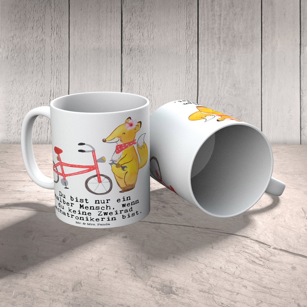 Tasse Zweirad Mechatronikerin mit Herz Tasse, Kaffeetasse, Teetasse, Becher, Kaffeebecher, Teebecher, Keramiktasse, Porzellantasse, Büro Tasse, Geschenk Tasse, Tasse Sprüche, Tasse Motive, Kaffeetassen, Tasse bedrucken, Designer Tasse, Cappuccino Tassen, Schöne Teetassen, Beruf, Ausbildung, Jubiläum, Abschied, Rente, Kollege, Kollegin, Geschenk, Schenken, Arbeitskollege, Mitarbeiter, Firma, Danke, Dankeschön