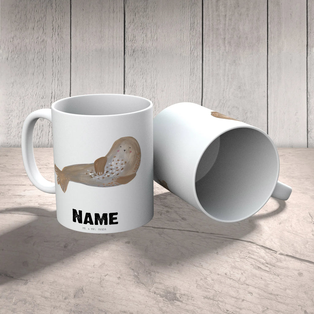 Personalisierte Tasse Robbe lachend Personalisierte Tasse, Namenstasse, Wunschname, Personalisiert, Tasse, Namen, Drucken, Tasse mit Namen, Tiermotive, Gute Laune, lustige Sprüche, Tiere, Robbe, Robben, Seehund, Strand, Meerestier, Ostsee, Nordsee