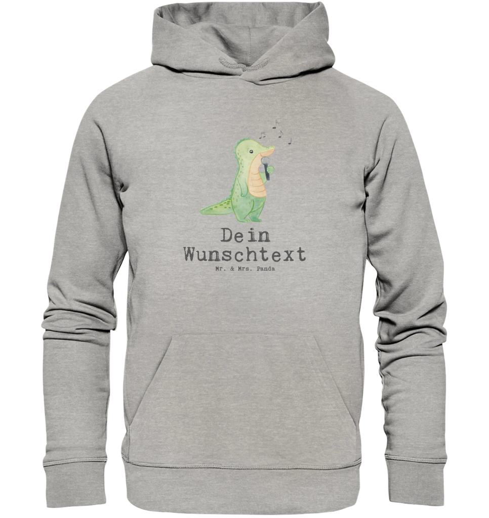 Personalisierter Hoodie Krokodil Singen Personalisierter Hoodie, Namens-Hoodie, Wunschtext-Hoodie, Text-Hoodie, Hoodie mit Spruch, Hoodie mit Logo, Hoodie mit Bild, Hoodie mit Foto, Hoodie mit Design, Hoodie mit Aufdruck, Kapuzenpullover mit Wunschtext, Kapuzenpullover mit Wunschname, Kapuzenpullover mit Namen, Kapuzenpullover personalisiert, Unisex Hoodie personalisiert, Hoodie Männer personalisiert, Hoodie Frauen personalisiert, Kapuzenpullover Männer personalisiert, Kapuzenpullover Frauen personalisiert, Oberteil personalisiert, Geschenk, Sport, Sportart, Hobby, Schenken, Danke, Dankeschön, Auszeichnung, Gewinn, Sportler, Singen, Band, Live Auftritt, Gesang, Hobbysänger