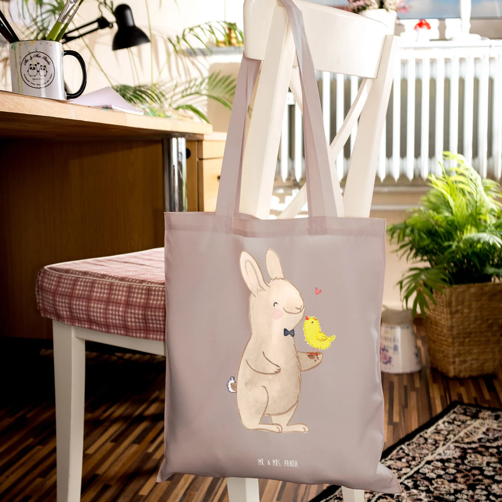 Tragetasche Hase mit Küken Beuteltasche, Beutel, Einkaufstasche, Jutebeutel, Stoffbeutel, Tasche, Shopper, Umhängetasche, Strandtasche, Schultertasche, Stofftasche, Tragetasche, Badetasche, Jutetasche, Einkaufstüte, Laptoptasche, Ostern, Osterhase, Ostergeschenke, Osternest, Osterdeko, Geschenke zu Ostern, Ostern Geschenk, Ostergeschenke Kinder, Ostern Kinder