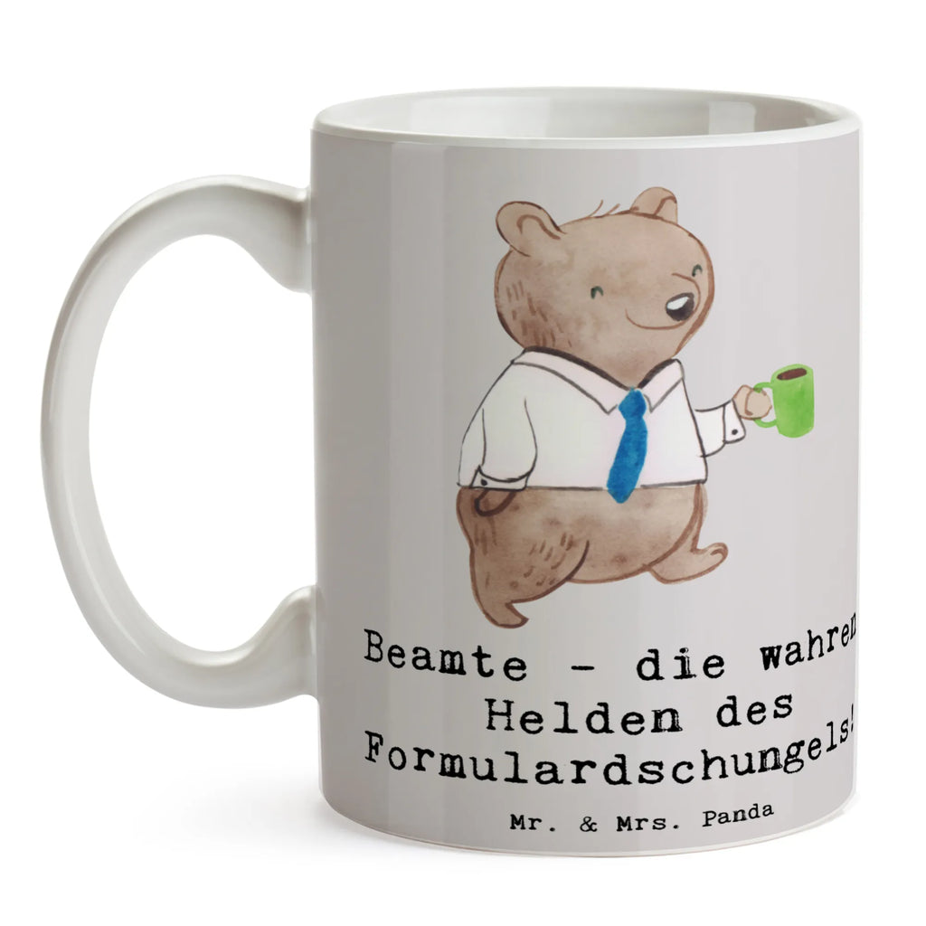 Tasse Beamtin Heldin Tasse, Kaffeetasse, Teetasse, Becher, Kaffeebecher, Teebecher, Keramiktasse, Porzellantasse, Büro Tasse, Geschenk Tasse, Tasse Sprüche, Tasse Motive, Kaffeetassen, Tasse bedrucken, Designer Tasse, Cappuccino Tassen, Schöne Teetassen, Beruf, Ausbildung, Jubiläum, Abschied, Rente, Kollege, Kollegin, Geschenk, Schenken, Arbeitskollege, Mitarbeiter, Firma, Danke, Dankeschön