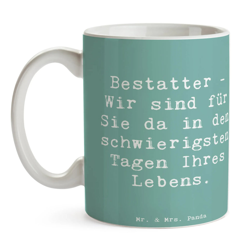 Tasse Spruch Bestatter - Wir sind für Sie da in den schwierigsten Tagen Ihres Lebens. Tasse, Kaffeetasse, Teetasse, Becher, Kaffeebecher, Teebecher, Keramiktasse, Porzellantasse, Büro Tasse, Geschenk Tasse, Tasse Sprüche, Tasse Motive, Kaffeetassen, Tasse bedrucken, Designer Tasse, Cappuccino Tassen, Schöne Teetassen, Beruf, Ausbildung, Jubiläum, Abschied, Rente, Kollege, Kollegin, Geschenk, Schenken, Arbeitskollege, Mitarbeiter, Firma, Danke, Dankeschön