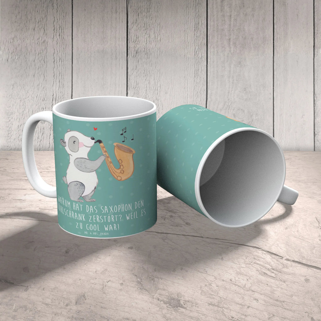 Mug Warum hat das Saxophon den Kühlschrank zerstört? Weil es zu cool war! Tasse, Kaffeetasse, Teetasse, Becher, Kaffeebecher, Teebecher, Keramiktasse, Porzellantasse, Büro Tasse, Geschenk Tasse, Tasse Sprüche, Tasse Motive, Kaffeetassen, Tasse bedrucken, Designer Tasse, Cappuccino Tassen, Schöne Teetassen, Instrumente, Geschenke Musiker, Musikliebhaber