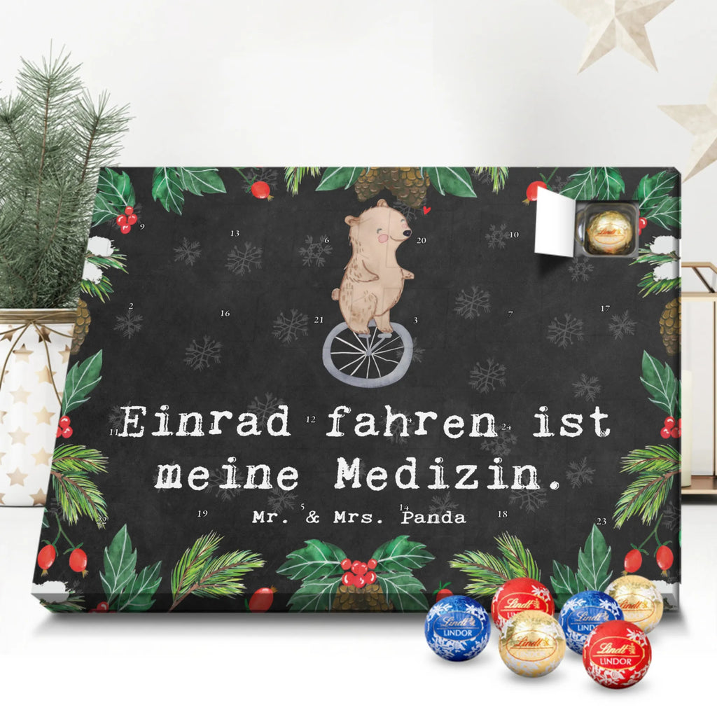 Kugel Markenschokolade Adventskalender Bär Einrad fahren Adventskalender, Weihnachtskalender, Kalender, Weihnachten, Schokoladen Adventskalender, Kugel Markenschokolade Adventskalender, Geschenk, Sport, Sportart, Hobby, Schenken, Danke, Dankeschön, Auszeichnung, Gewinn, Sportler, Einrad fahren