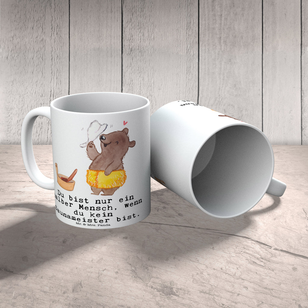 Tasse Saunameister mit Herz Tasse, Kaffeetasse, Teetasse, Becher, Kaffeebecher, Teebecher, Keramiktasse, Porzellantasse, Büro Tasse, Geschenk Tasse, Tasse Sprüche, Tasse Motive, Kaffeetassen, Tasse bedrucken, Designer Tasse, Cappuccino Tassen, Schöne Teetassen, Beruf, Ausbildung, Jubiläum, Abschied, Rente, Kollege, Kollegin, Geschenk, Schenken, Arbeitskollege, Mitarbeiter, Firma, Danke, Dankeschön