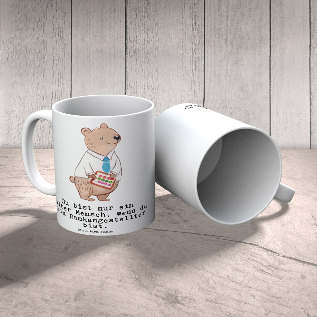 Tasse Bankangestellter mit Herz Tasse, Kaffeetasse, Teetasse, Becher, Kaffeebecher, Teebecher, Keramiktasse, Porzellantasse, Büro Tasse, Geschenk Tasse, Tasse Sprüche, Tasse Motive, Kaffeetassen, Tasse bedrucken, Designer Tasse, Cappuccino Tassen, Schöne Teetassen, Beruf, Ausbildung, Jubiläum, Abschied, Rente, Kollege, Kollegin, Geschenk, Schenken, Arbeitskollege, Mitarbeiter, Firma, Danke, Dankeschön, Bankangestellter, Bankfachmann, Bänker, Bankberater