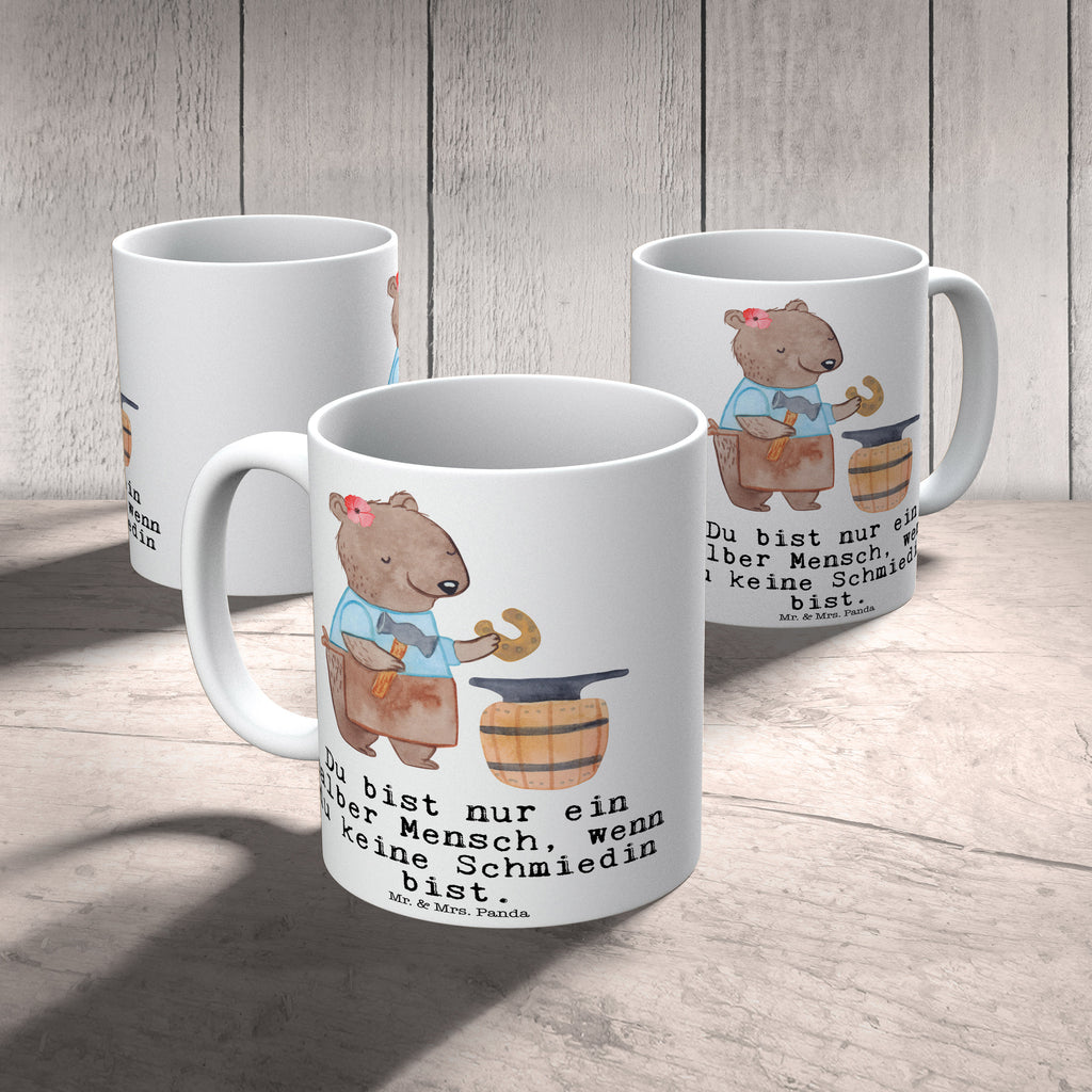 Tasse Schmiedin mit Herz Tasse, Kaffeetasse, Teetasse, Becher, Kaffeebecher, Teebecher, Keramiktasse, Porzellantasse, Büro Tasse, Geschenk Tasse, Tasse Sprüche, Tasse Motive, Kaffeetassen, Tasse bedrucken, Designer Tasse, Cappuccino Tassen, Schöne Teetassen, Beruf, Ausbildung, Jubiläum, Abschied, Rente, Kollege, Kollegin, Geschenk, Schenken, Arbeitskollege, Mitarbeiter, Firma, Danke, Dankeschön