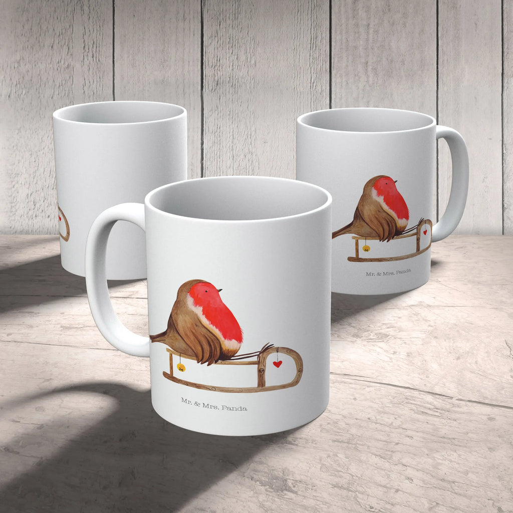 Tasse Rotkehlchen Schlitten Tasse, Kaffeetasse, Teetasse, Becher, Kaffeebecher, Teebecher, Keramiktasse, Porzellantasse, Büro Tasse, Geschenk Tasse, Tasse Sprüche, Tasse Motive, Kaffeetassen, Tasse bedrucken, Designer Tasse, Cappuccino Tassen, Schöne Teetassen, Winter, Weihnachten, Weihnachtsdeko, Nikolaus, Advent, Heiligabend, Wintermotiv, Schlitten, Vogel