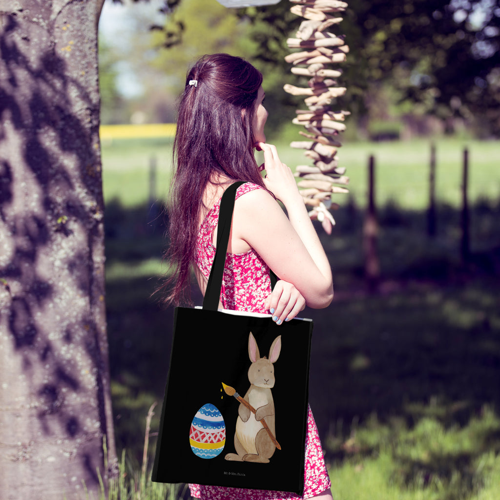 Tragetasche Hase Eier Malen Beuteltasche, Beutel, Einkaufstasche, Jutebeutel, Stoffbeutel, Tasche, Shopper, Umhängetasche, Strandtasche, Schultertasche, Stofftasche, Tragetasche, Badetasche, Jutetasche, Einkaufstüte, Laptoptasche, Ostern, Osterhase, Ostergeschenke, Osternest, Osterdeko, Geschenke zu Ostern, Ostern Geschenk, Ostergeschenke Kinder, Ostern Kinder, Frohe Ostern, Ostergrüße, Osterblume, Osterei, bemalte Ostereier, Hase, Kaninchen, Eiermalen