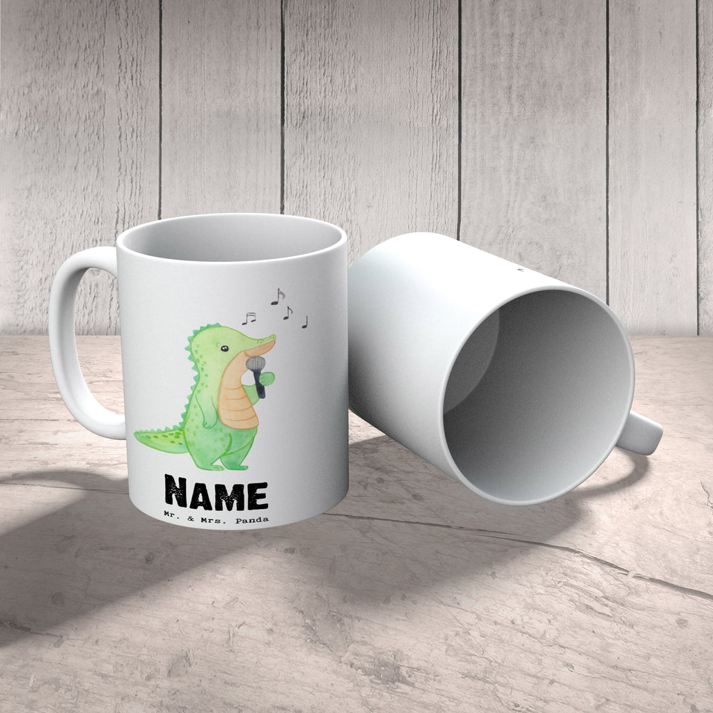 Personalisierte Tasse Krokodil Singen Personalisierte Tasse, Namenstasse, Wunschname, Personalisiert, Tasse, Namen, Drucken, Tasse mit Namen, Geschenk, Sport, Sportart, Hobby, Schenken, Danke, Dankeschön, Auszeichnung, Gewinn, Sportler, Singen, Band, Live Auftritt, Gesang, Hobbysänger