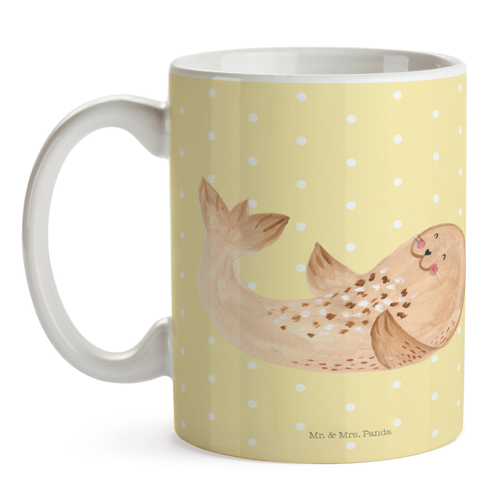 Tasse Robbe liegend Tasse, Kaffeetasse, Teetasse, Becher, Kaffeebecher, Teebecher, Keramiktasse, Porzellantasse, Büro Tasse, Geschenk Tasse, Tasse Sprüche, Tasse Motive, Kaffeetassen, Tasse bedrucken, Designer Tasse, Cappuccino Tassen, Schöne Teetassen, Tiermotive, Gute Laune, lustige Sprüche, Tiere, Robbe, Robben, Seehund, Strand, Meerestier, Ostsee, Nordsee, Lachen, Freude