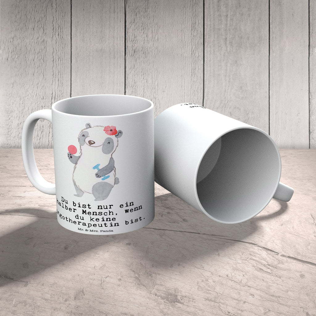 Tasse Ergotherapeutin mit Herz Tasse, Kaffeetasse, Teetasse, Becher, Kaffeebecher, Teebecher, Keramiktasse, Porzellantasse, Büro Tasse, Geschenk Tasse, Tasse Sprüche, Tasse Motive, Kaffeetassen, Tasse bedrucken, Designer Tasse, Cappuccino Tassen, Schöne Teetassen, Beruf, Ausbildung, Jubiläum, Abschied, Rente, Kollege, Kollegin, Geschenk, Schenken, Arbeitskollege, Mitarbeiter, Firma, Danke, Dankeschön, Ergotherapeutin, Ergotherapie